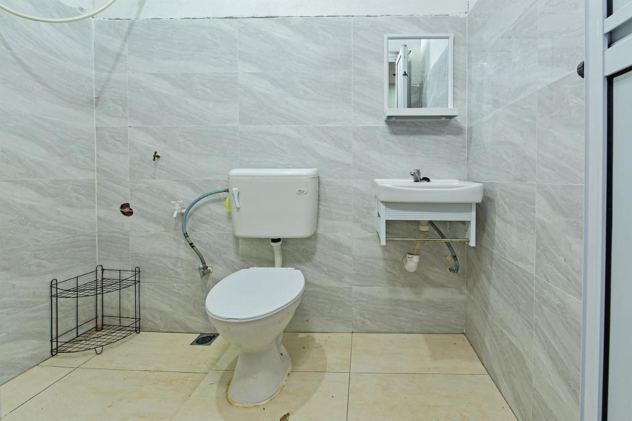 OYO 90596 Casaria Inn Paka Bagian luar foto