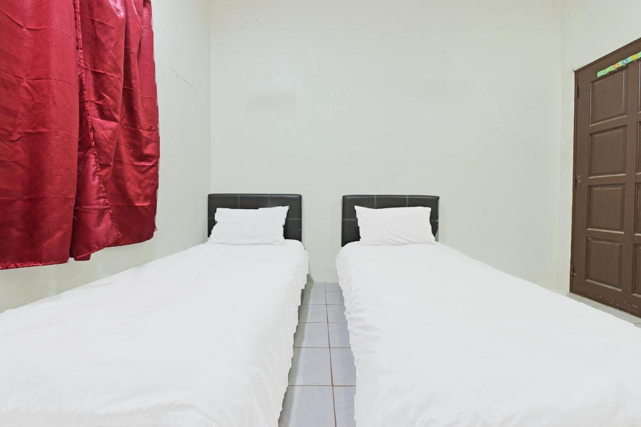 OYO 90596 Casaria Inn Paka Bagian luar foto