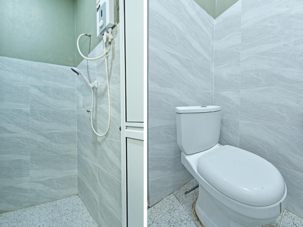 OYO 90596 Casaria Inn Paka Bagian luar foto